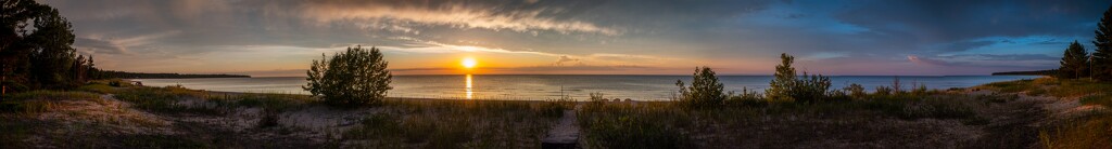 Sand Bay sunrise panorama at Beaver Island, MI by mdaskin
