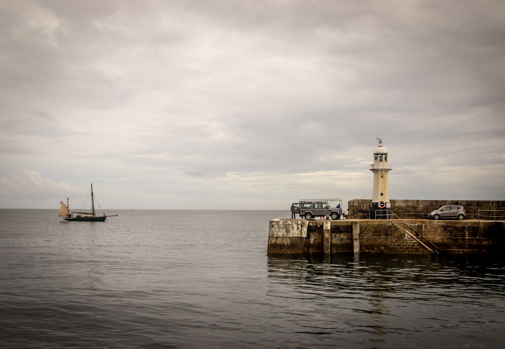 Boat and lighthouse by swillinbillyflynn