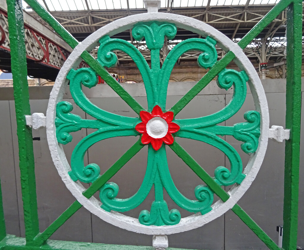 Detail from red, green and white paintwork at Preston Station by marianj