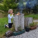 Connor fascinated by fire making.