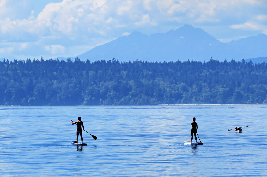Two Paddle Boarders and A Kayaker by seattlite