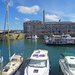 A local ferry in front of Royal William Yard, Plymouth by marianj