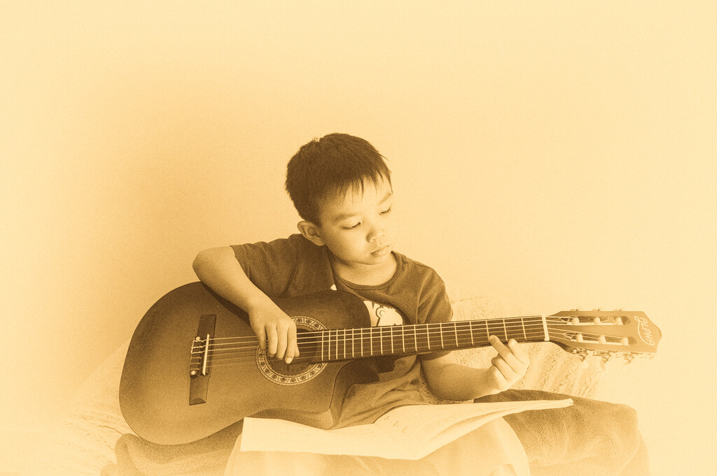 playing guitar after school by mumuzi