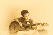 14th Sep 2022 - playing guitar after school