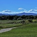 View of the Rockies from golf course, Loveland by sandlily