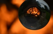 20th Sep 2022 - The garden chiminea fire through an orb