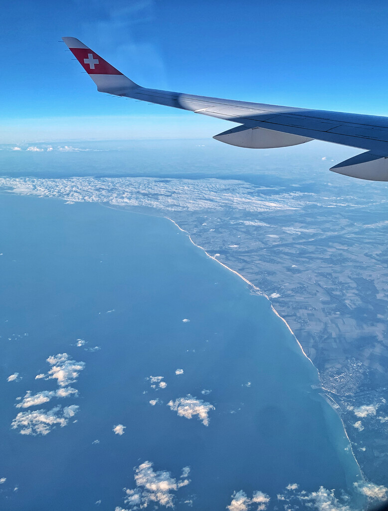 Above the French coast.  by cocobella