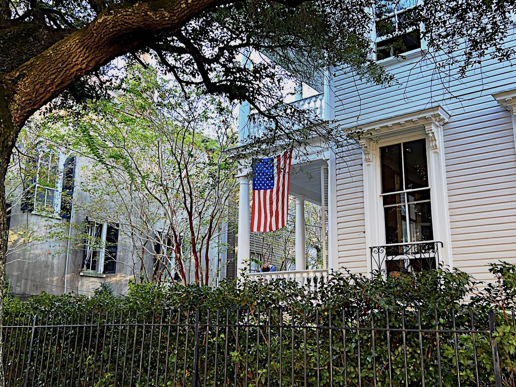 Old neighborhood and house with flag by congaree
