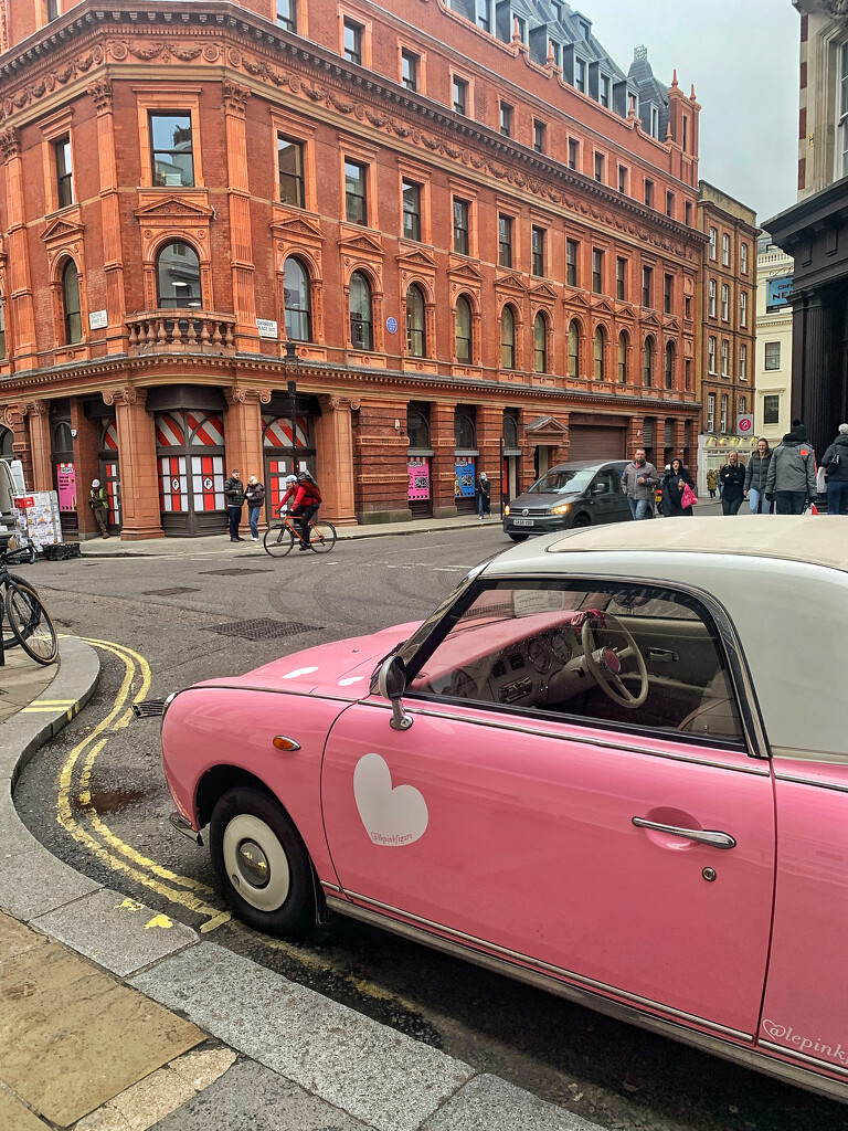 A pink car with a heart.  by cocobella