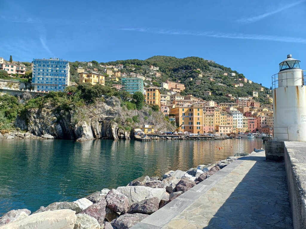 Harbour wall and lighthouse at Camogli by busylady
