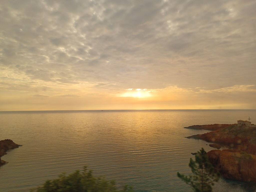 Sunrise from the train by busylady