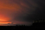 23rd Oct 2022 - Light over the rooftops tonight after a sudden storm. Drama to match the politics in the UK at the moment!