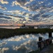 Shrimp boat and sky reflection by congaree