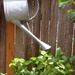 Watering can just hanging there