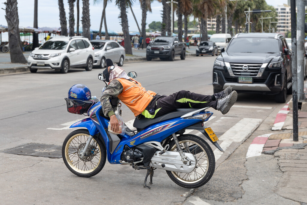 Motor Cycle Taxi Driver Relaxing by lumpiniman