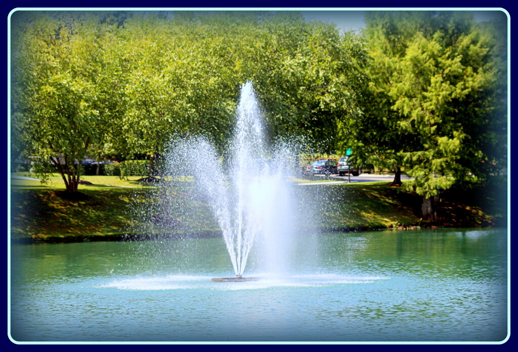 Fountain in lake by vernabeth