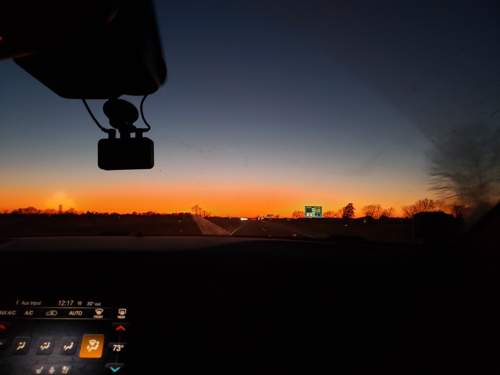 Beautiful sunset driving home from Canada by jill2022
