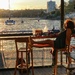 Sunset drinks at a local bar/restaurant in Manly. My friend looking after my seat.  by johnfalconer