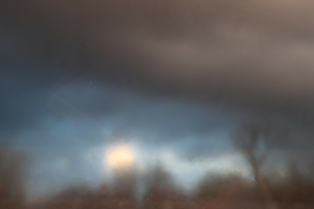 Abstract stormy evening. Through a misty window by 365jgh