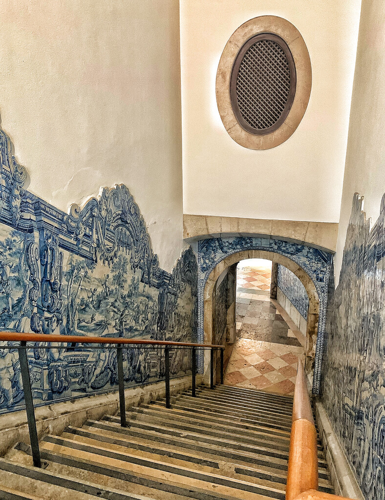Azulejos in the stairs.  by cocobella