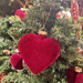 Red heart on a Christmas tree. 