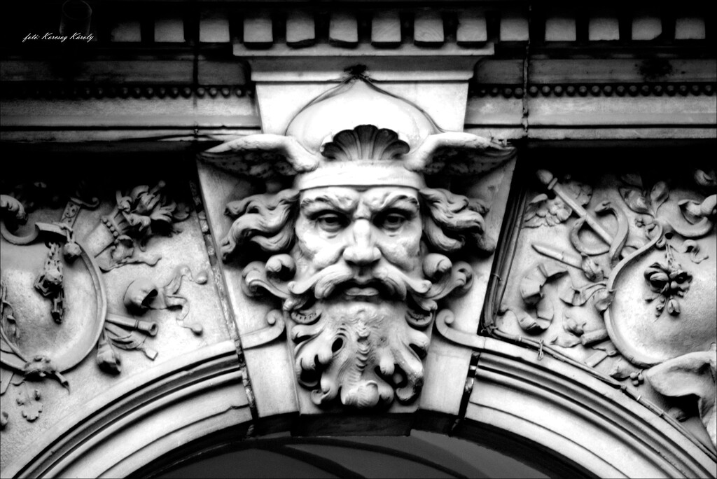 Faces on Budapest houses (2) by kork