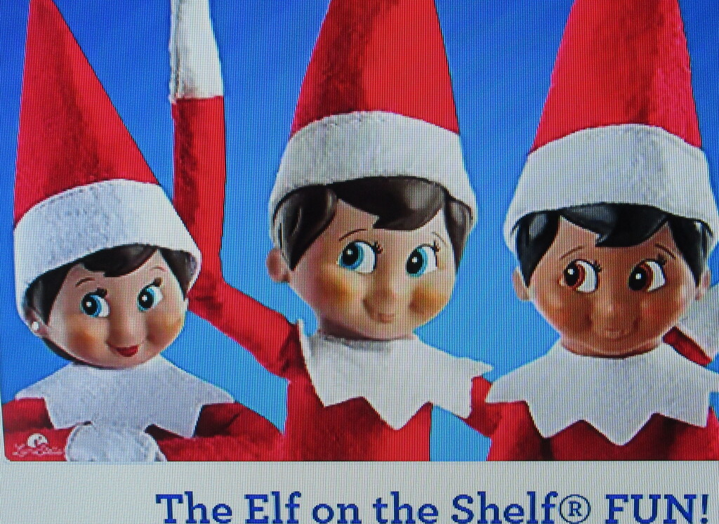 Three smiling elves from "Toys r us" by bruni