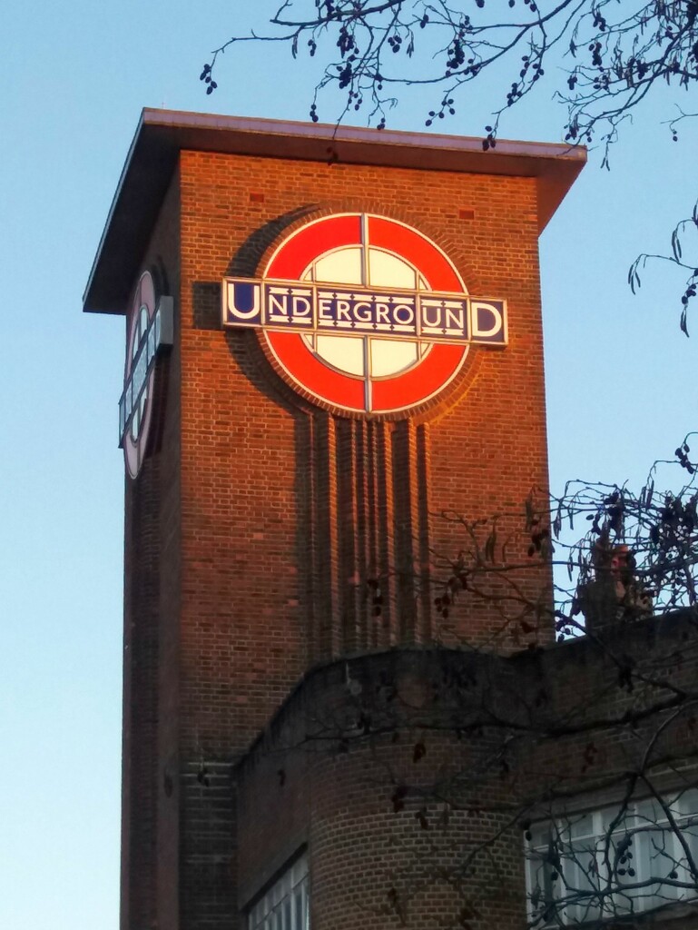 The underground sign seemed to glow in the late afternoon sun by anitaw