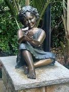 6th Jan 2023 - Girl holding a monarch butterfly this piece was done by her Dad who also did a sculpture of his Labrador dog as well he resides in Auckland this sculpture I tthought is stunning 