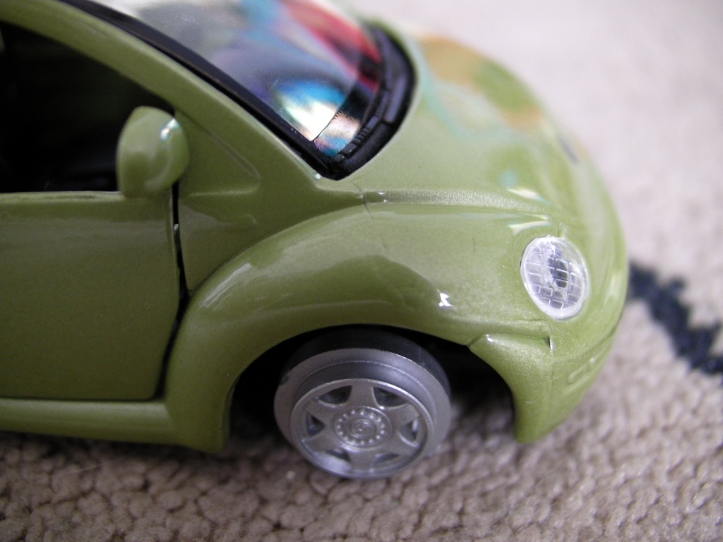 Toy Car Missing Tyres by natsnell