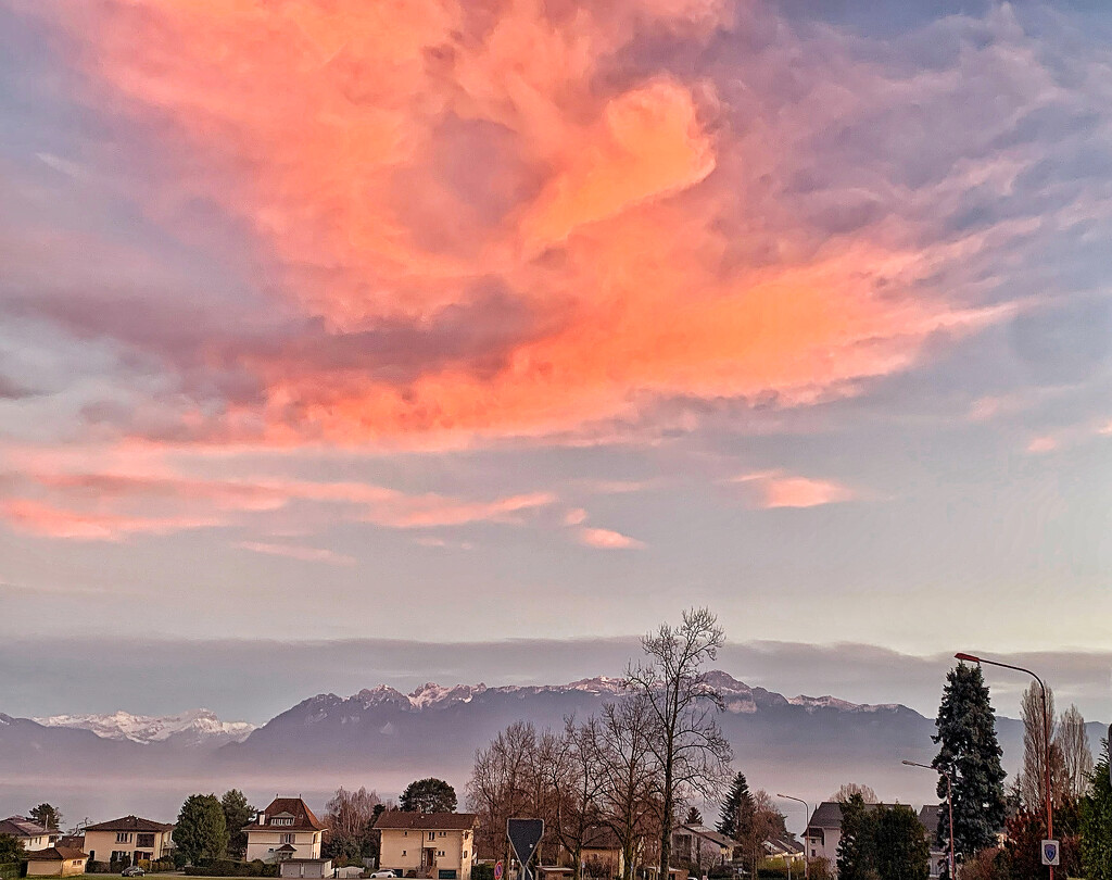 Pink cloud above mountains.  by cocobella