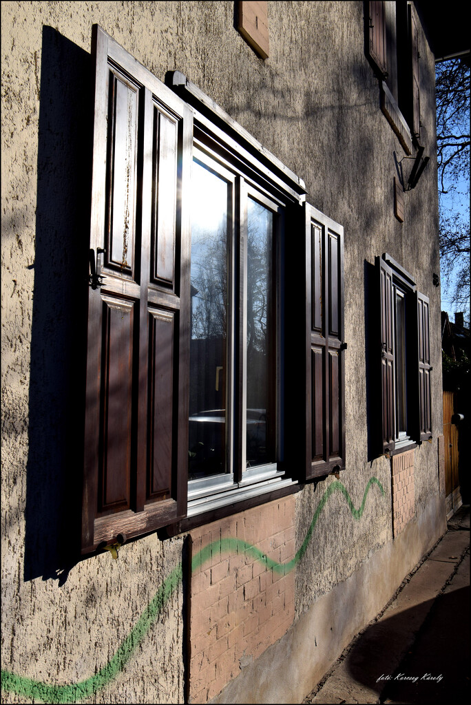 A window in the Wekerle district by kork
