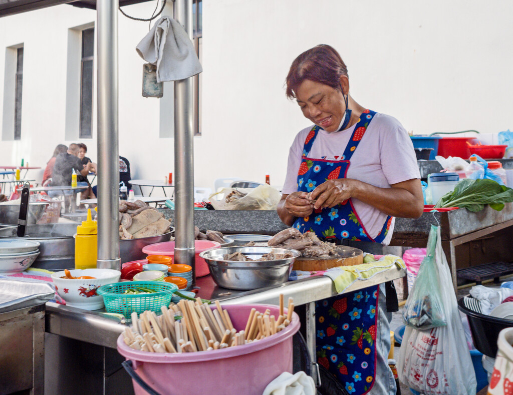 Preparing food, Street Vendor. by ianjb21