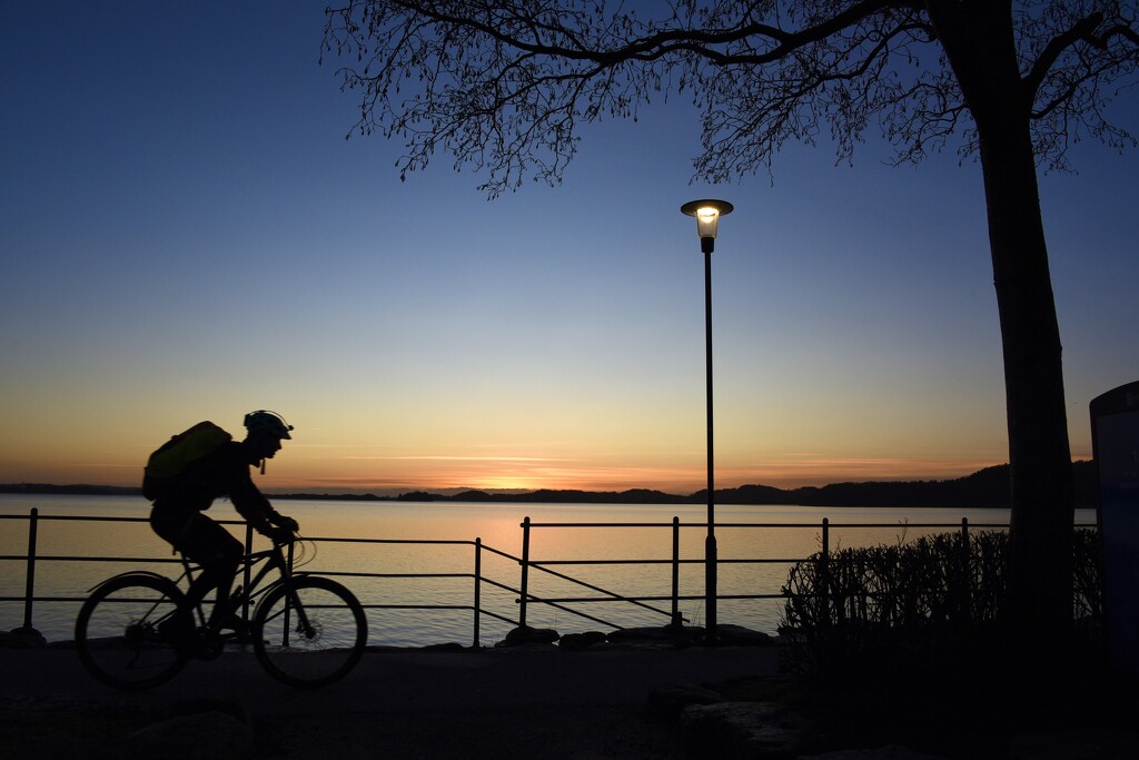 Sunset cyclist by clearlightskies
