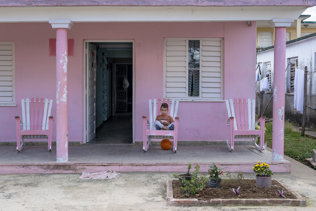 Playing on the Pink Porch by jyokota