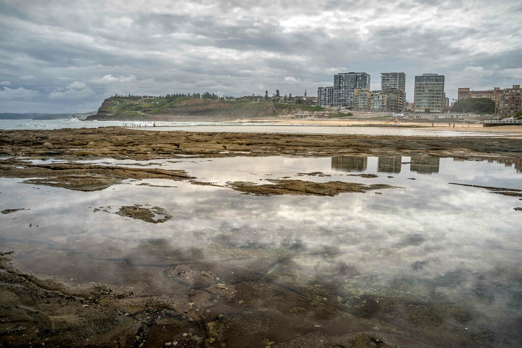 Newcastle beach reflections by pusspup