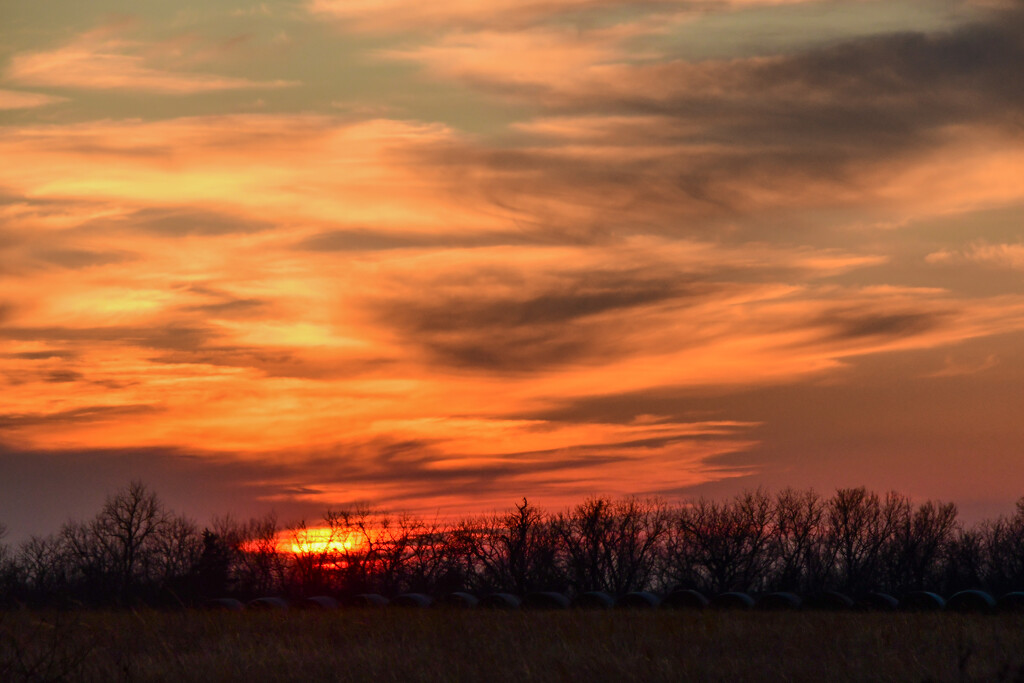 Kansas Sunset and Haybales by kareenking