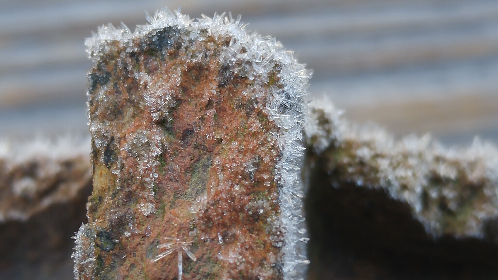 Frost crystals on a broken brick... by marlboromaam