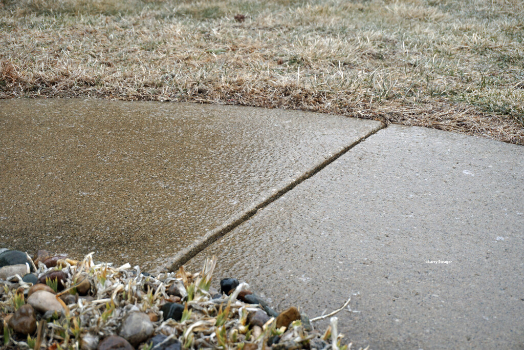 Ice coating on the walkway by larrysphotos