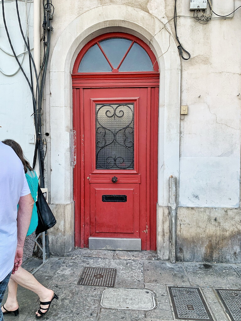 Two hearts on red door.  by cocobella