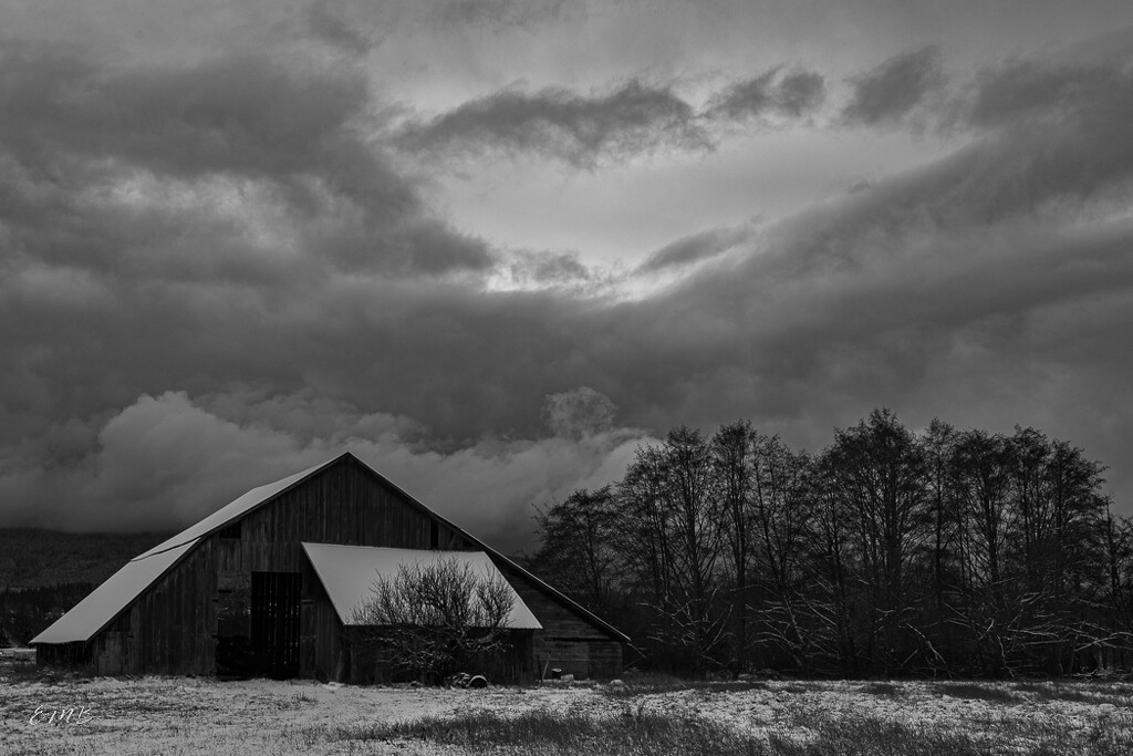 Barn under storm clouds by theredcamera