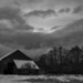 Barn under storm clouds by theredcamera