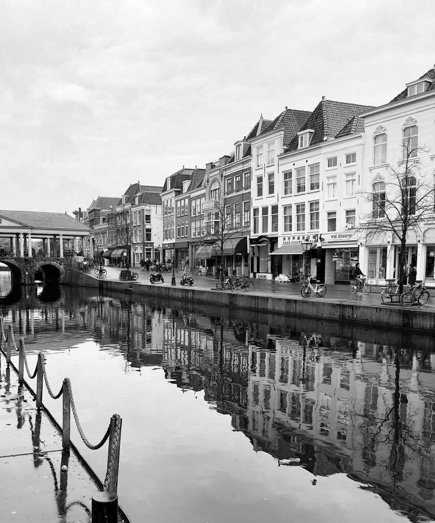 Canal reflections of charming Leiden by cristinaledesma33