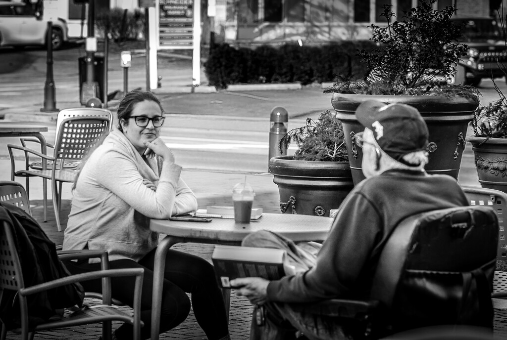 Newfound friends chat in the town square by ggshearron