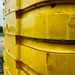 Stack of empty Yellow tubs