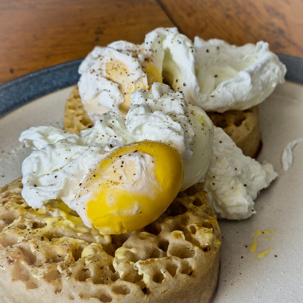 Poached eggs on crumpets  by andyharrisonphotos