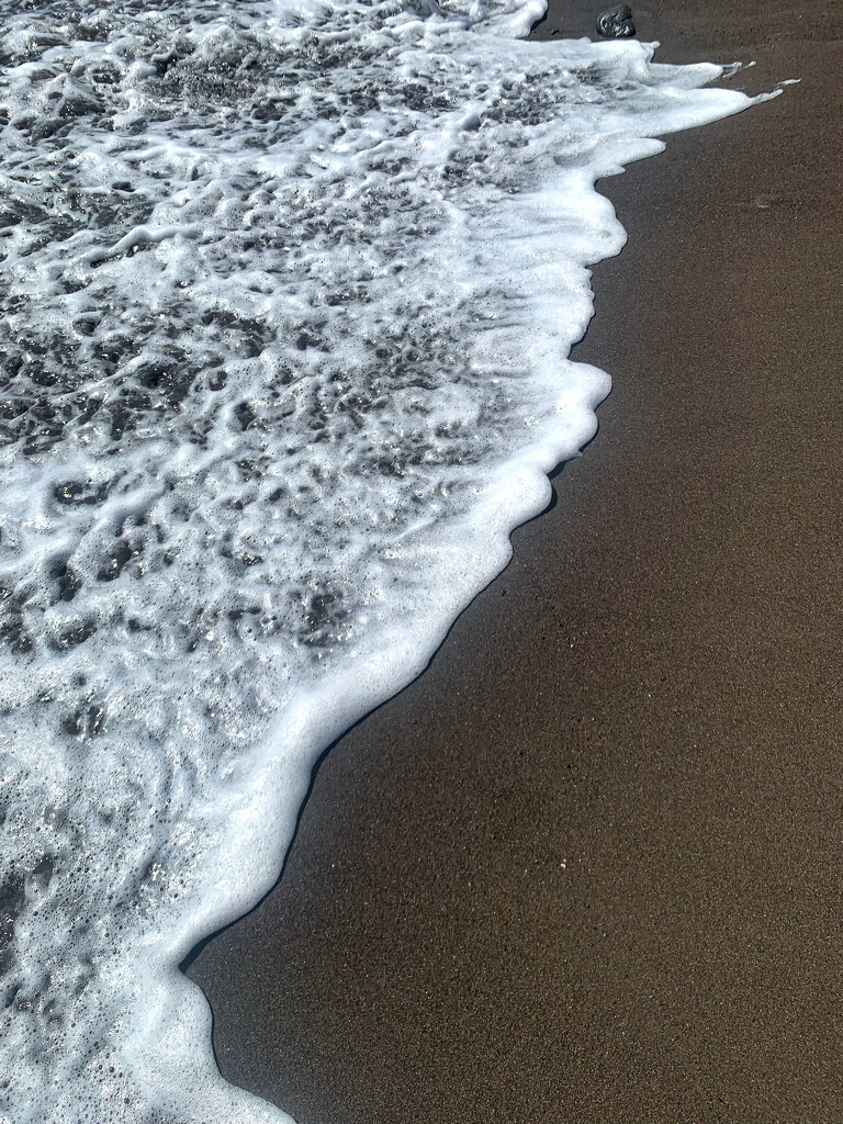 Black sand beach.  by cocobella
