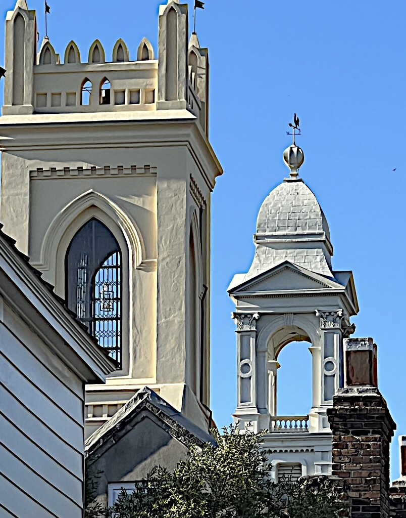 Two old historic church steeples  in Charleston, one Unitarian and the other Lutheran (right) by congaree