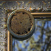 Rusty Lid on ornate mirror by metzpah