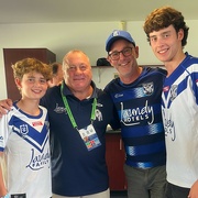 25th Mar 2023 - My grandsons and their dad meet their Rugby League team’s hero from the past, Terry Lamb OAM. I missed the match so my daughter took this photo after the Bulldogs had won. 